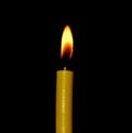 Candle flame closeup isolated on black background Royalty Free Stock Photo