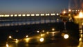 Candle flame lights in glass, romantic beach date by ocean waves, summer sea. Candlelight on sand.