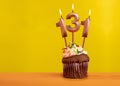 Number 131 birthday candle - Celebration on yellow background