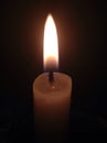 Candle flame shining in the dark Royalty Free Stock Photo