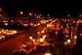 Candle flames illuminating on cemetery