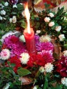 Candle is floating on flower vase at Indian Bengali marriage Royalty Free Stock Photo