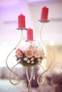 Candle and flower stand on wedding table Royalty Free Stock Photo