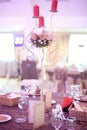 Candle and flower stand on wedding table Royalty Free Stock Photo