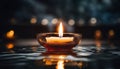 A candle in a glass bowl candle holder is reflected Royalty Free Stock Photo