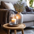 Candle glass jar with burning candle. Home decor and accent pieces. Interior design of modern living room