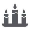Candle glyph icon, fire and light, candlelight sign, vector graphics, a solid pattern on a white background. Royalty Free Stock Photo