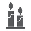 Candle glyph icon, flame and spirituality, fire sign, vector graphics, a solid pattern on a white background. Royalty Free Stock Photo