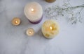 Candle, gypsophila vintage romance ornament flower on a concrete background