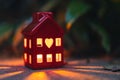 Candle holder. Ceramic lantern tea light holder. Small red cozy house with windows. Light burning inside house