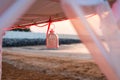 Candle holder hanging from beach cabana