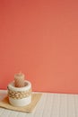 Candle holder on white table. pink wall background. cozy home decor Royalty Free Stock Photo