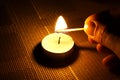 Candle ignition with match Royalty Free Stock Photo