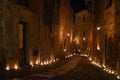 Illuminated medieval stone street