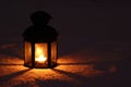 Candle lamp in snow Royalty Free Stock Photo