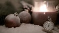 Candle lantern, christmas balls and clock