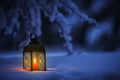 Candle lantern in the snow