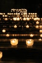 Candle light in a Cathedral. Royalty Free Stock Photo