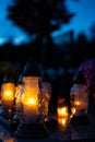Lanterns in the cemetery at night. Selective focus.