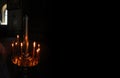 Candle light in dark in Christianity church Royalty Free Stock Photo