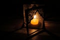 Candle light in the darkness and candle holder Royalty Free Stock Photo