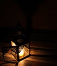 Candle light in the darkness and candle holder Royalty Free Stock Photo