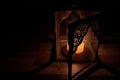 Candle light in the darkness and candle holder Royalty Free Stock Photo