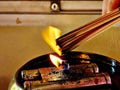 Candle light fire candlestick with burning joss stick incense for Buddhists devotion in shine or temple. Royalty Free Stock Photo