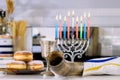 Candle light during Hanukkah celebrations Hanukkah Jewish religion holiday symbol