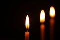 Candle light isolated on black background. Royalty Free Stock Photo