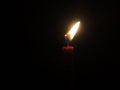 candle light shining in the darkness Royalty Free Stock Photo