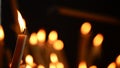 Candle lighting with candles defocused in background