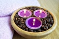 Candle lights with coffe beans for spa and christmas decoration concept Royalty Free Stock Photo