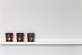 Candle lights on white shelf Royalty Free Stock Photo