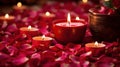 A candle lit on a table surrounded by red rose petals, AI Royalty Free Stock Photo