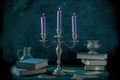 Candle magic. A witch's study with old books and magick potions