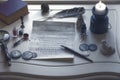 Antique writing materials and a candle on the table Royalty Free Stock Photo