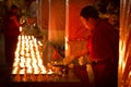 Candle monk of Drepung Monastery Lhasa Tibet