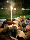 Candle night dinner set up at night event outdoors Royalty Free Stock Photo