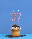 Candle number 37 - Birthday card with cupcake on blue background