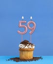 Candle number 59 - Birthday card with cupcake on blue background