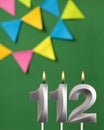 Candle number 112 birthday - Green anniversary card with pennants