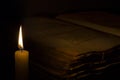 Candle and old book Royalty Free Stock Photo