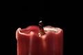 Candle out of Fire on Black background, Extinguished Flame Royalty Free Stock Photo