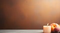 A candle and peach on a table with some leaves, AI