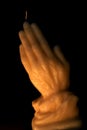 Candle of Praying Hands Royalty Free Stock Photo