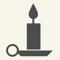 Candle solid icon. Holiday candlestick on holder glyph style pictogram on white background. New Year or Christmas candle
