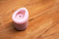 Candle stub on a wooden table