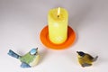 The candle and two birds II Royalty Free Stock Photo