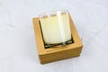 Candle in white glass mock up in carton card board box. Glass candle aromatic mockup. Copy space. Mock up for branding identity